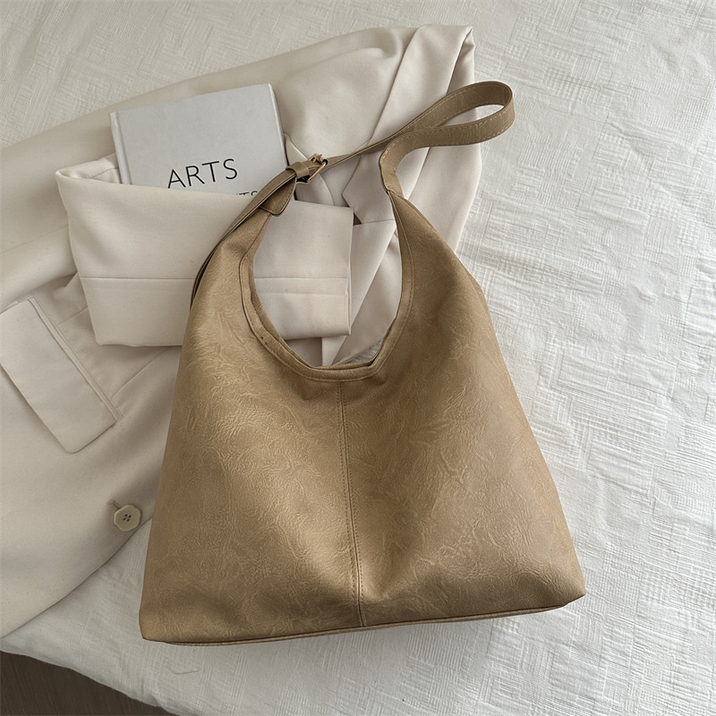 2025 primavera nueva moda bolsos de mano de hombro de gran capacidad bolsos tote bolsos de mujer bolsos de viaje bolsos versátiles para mujeres