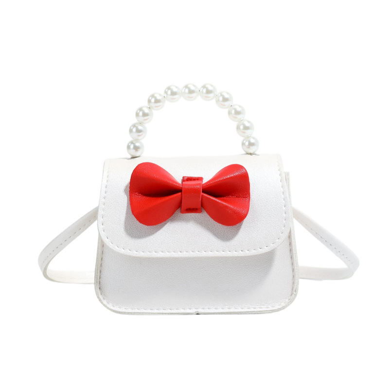 Bolsos para niños arco extranjero mini lindos bebés mochilas bolsos de perlas dulces bolsos de hombro para padres e hijos