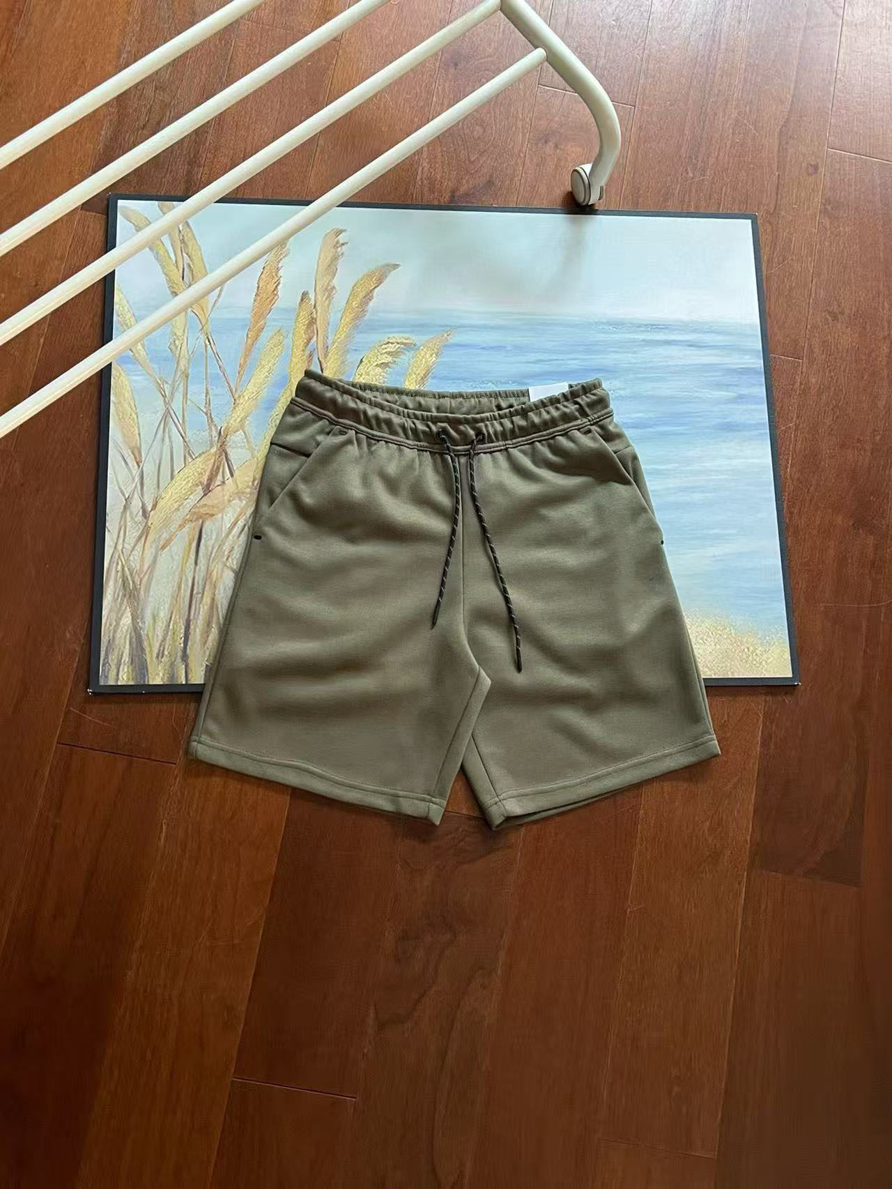 Verano nuevo estilo pequeño gancho versión en el extranjero de doce colores pantalones cortos deportivos de punto de pegamento lateral para hombres pantalones de cinco puntos 4503