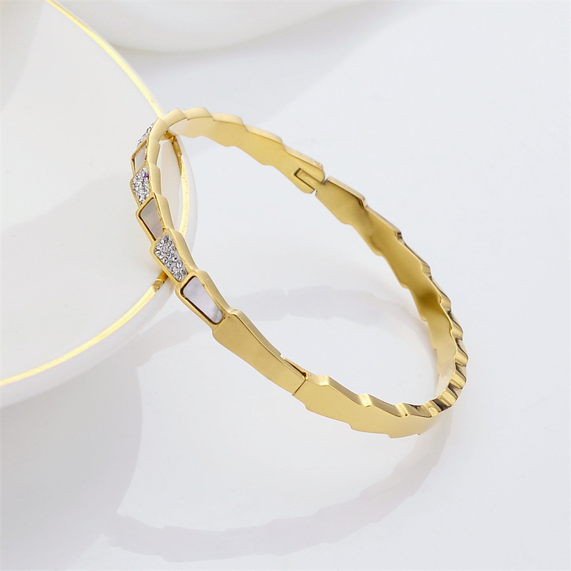 Personalidad de moda transfronteriza aleatoria pulsera de hueso de serpiente temperamento ligero lujoso viento micro-pantalón joyería pulsera de hoja de ventilador de piedra
