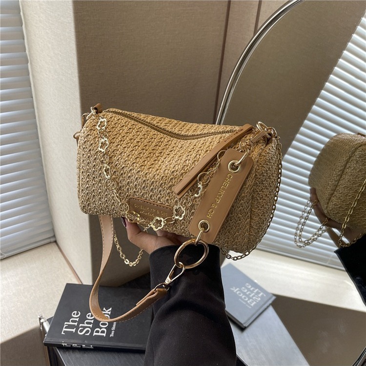 Nicho de diseño sensación de bolso de paja para mujeres verano 2024 nuevo popular bolso de cadena de hombro bolso de brazo