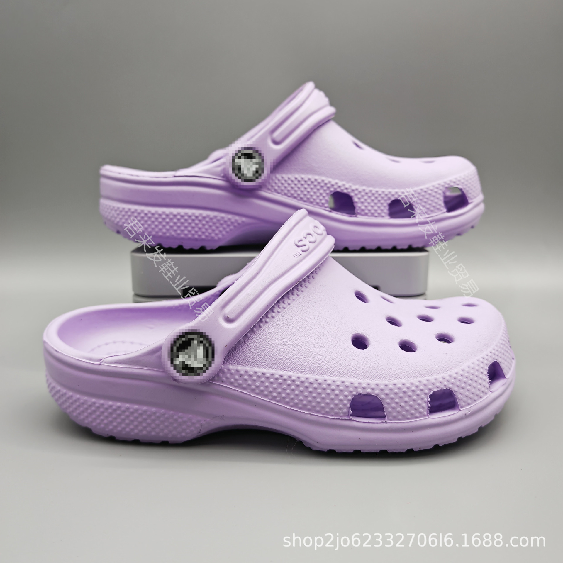 Fábrica de venta directa de zapatos de hueco de niños y niñas, zapatos de verano respirables antideslizantes zapatillas de playa ligeras al por mayor