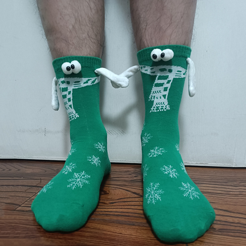 手をつないで靴下のカップルの磁気は取っ手を吸ってかわいいです。|undefined