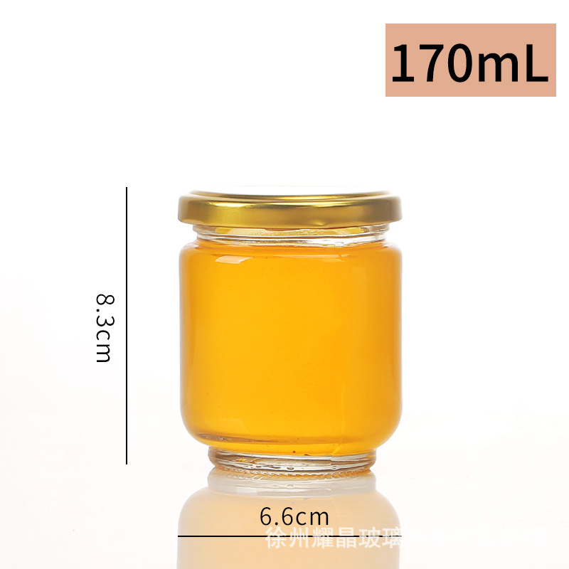 Botella de vidrio redonda de grado alimenticio, botella enlatada transparente sellada, botella de salsa de chile vacía, botella de miel con tapa para cocinar