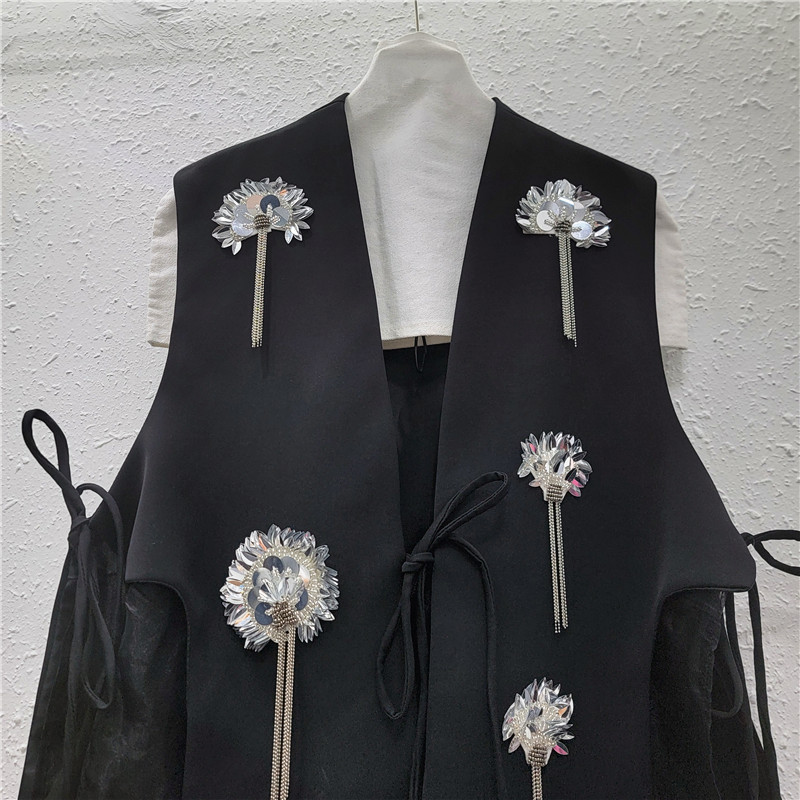 Traje negro chaleco de mujer 2026 nuevo chaqueta de pañuelo chaqueta de caballo empalmado ogan plegable sin mangas