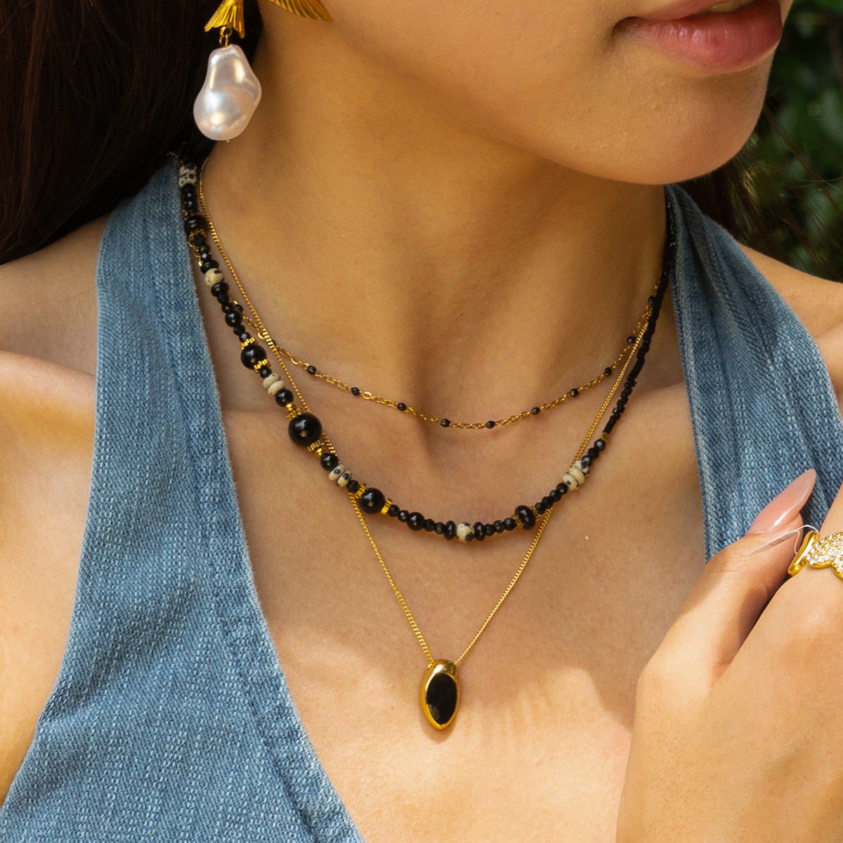 Collar de acero inoxidable TENA Europa y América lujo ligero nicho universal piedra natural collar de acero titanio mujer cruzada venta caliente cadena clavícula