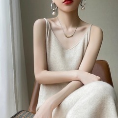 カシミヤのサスペンダーのスカートの女性の春秋の服の新型vネックの氷の糸のニットのワンピースはゆったりしています。