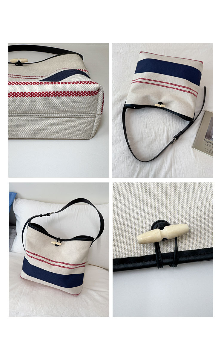 Korean version large-capacity women's 2025 new style fashionable canvas striped single-shoulder underarm bag casual commuting tote bag Item Picture