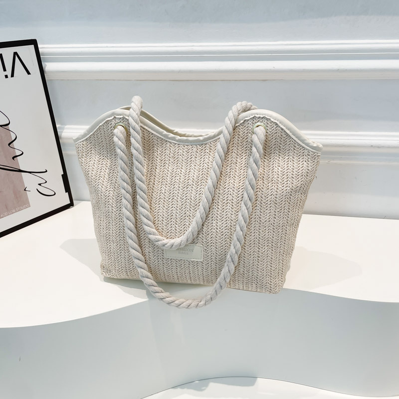 2025 nuevo bolso de verano de gran capacidad vacaciones junto al mar ocio tejido de paja bolso de un solo hombro tejido de nicho