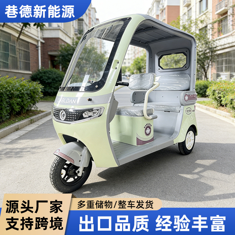 Nuevo tipo de triciclo eléctrico con cabina doméstica puede ser etiquetado como vehículo eléctrico de doble fila, pequeño vehículo eléctrico de tres ruedas con tolda