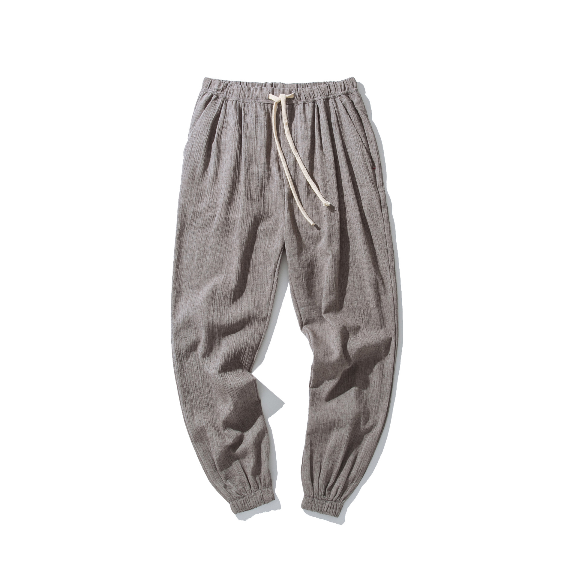 Verano 2021 estilo coreano estilo chino lino fino pantalones casuales pantalones de hombre tappered pantalones sueltos