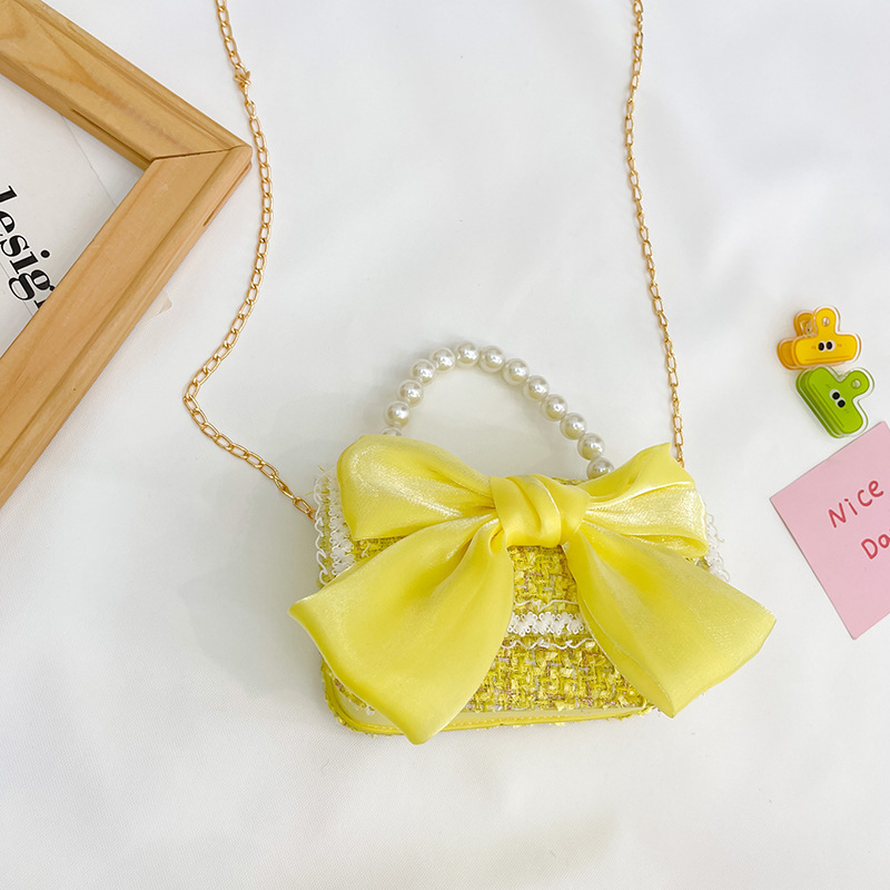 2025 nueva versión coreana de lana de lana, algodón, lino, niños, lazo, perlas, accesorios portátiles, bolsos, bolsos, bolsos de mujer