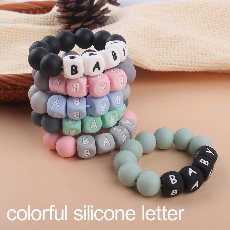 Nuevo bebé suministros mordedor pulsera creativa DIY nombre colorido de silicona letras mordedura juguete