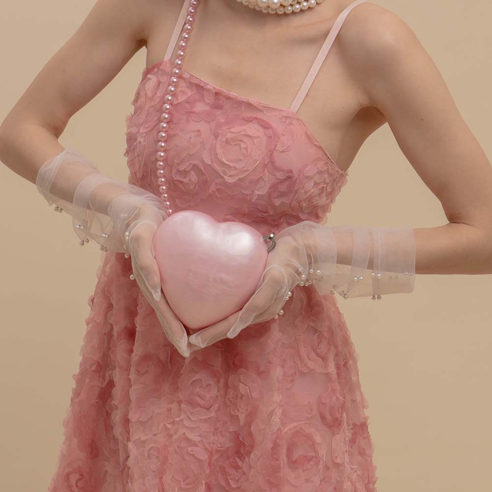Elegante borsa a mano in acrilico trasparente con cuore pochette sera_voghion.com