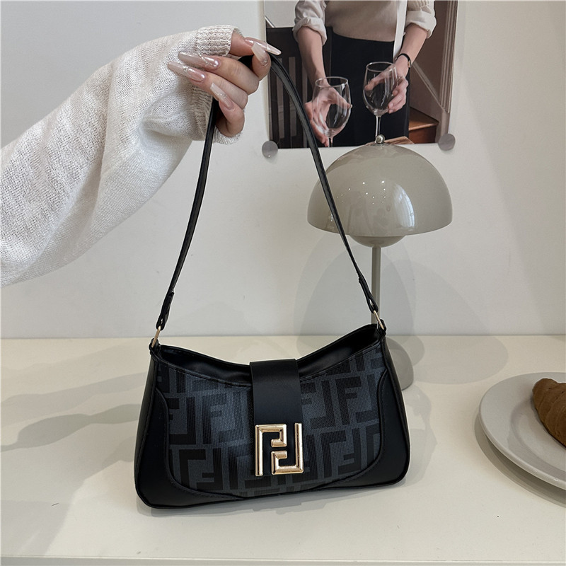 Bolsa de mitad de mes caliente 2025 nueva mujer color transfronterizo bolso de hombro brazalete de alto nivel nicho bolso de diseño