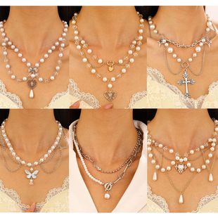 European and American cross-border jewelry niche design spicy girl imitation pearl tassel love cross butterfly all-match necklace for women
