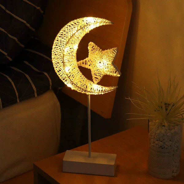 Paper rope moon hugging stars