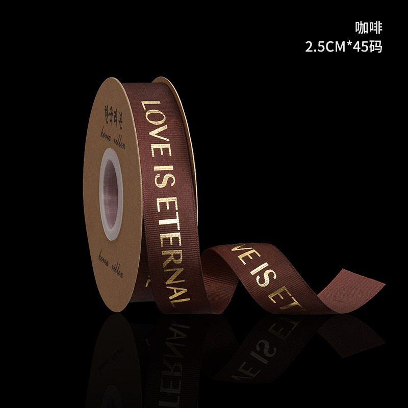 2,5 cm dorado cinta tienda de flores material de DIY floral al por mayor de la flor de poliéster Inglés carta envuelta cinta de la flor