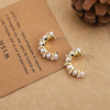 Design golden high-end metal earrings with letters from pearl