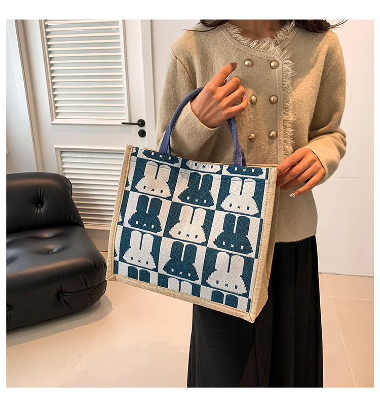 High-end mid-capacity canvas school commuting handbag 2024 new style fashionable and versatile linen single-shoulder tote bag undefined