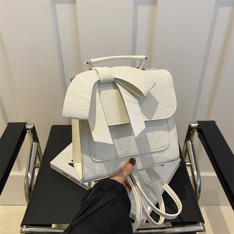 Zaino da donna con fiocco, nuovo modello di tendenza 2024, stile college, borsa a mano versatile, borsa da viaggio._voghion.com
