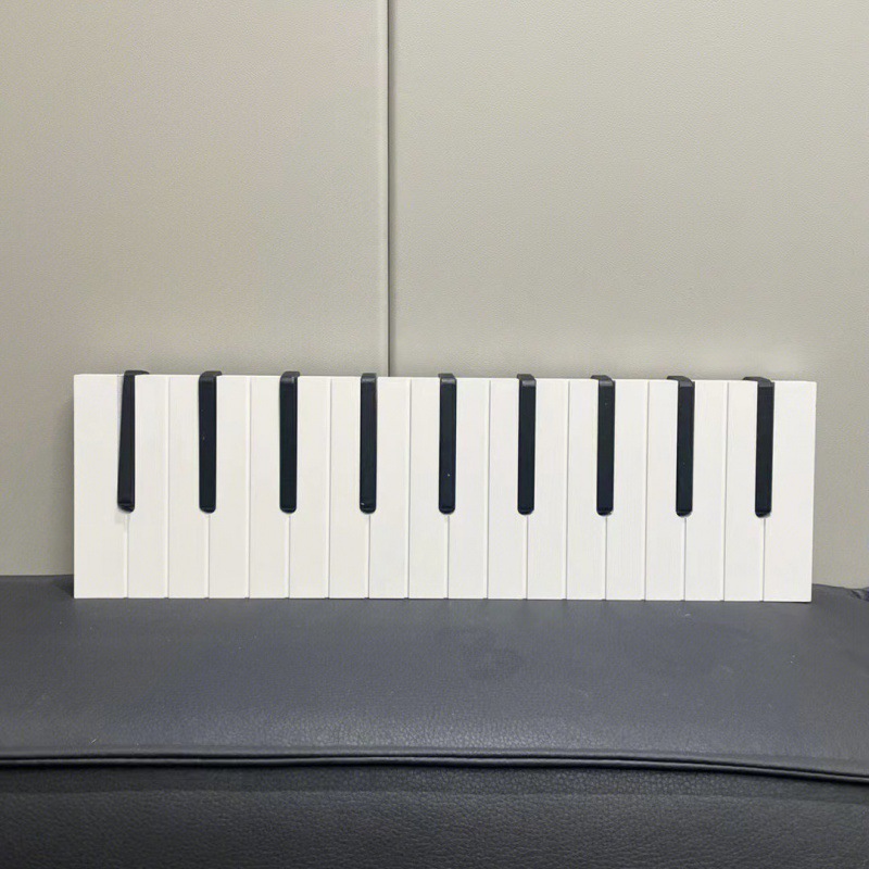 Creativo piano llave puerta colgar gancho de ropa en la casa colgar percha de ropa estante de pared ropa bolsa gancho porche