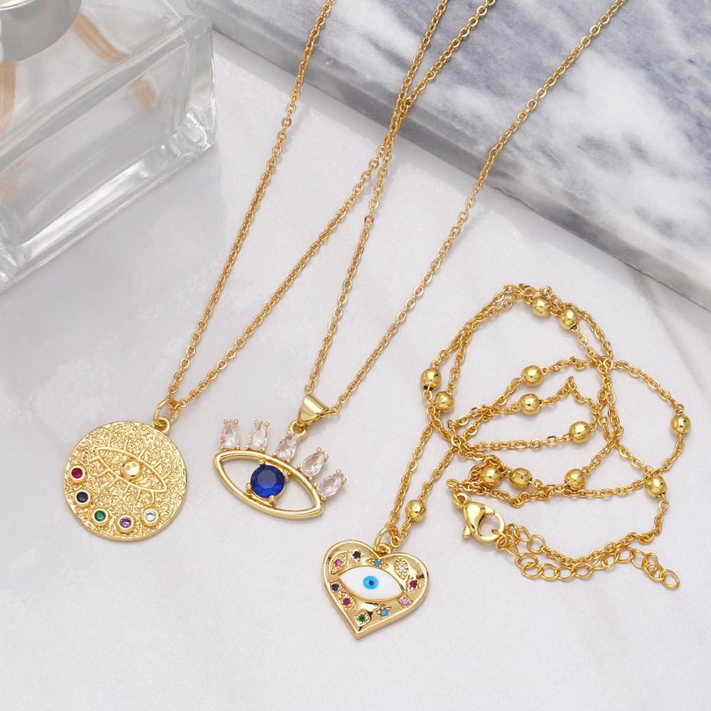 Fashion New Devilu0027s Eye Inlaid Diamond Geometric Heart Pendant Zircon Copper Necklace