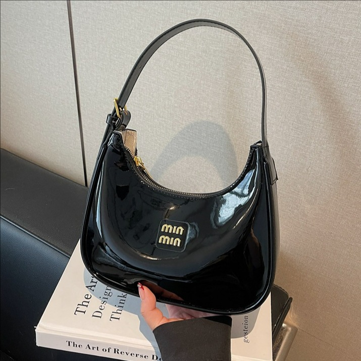Transfronterizo de alto rendimiento pintado de hombro brazo bolso 2025 nuevo bolso de mano de palo de viaje de hombro bolso de mujer