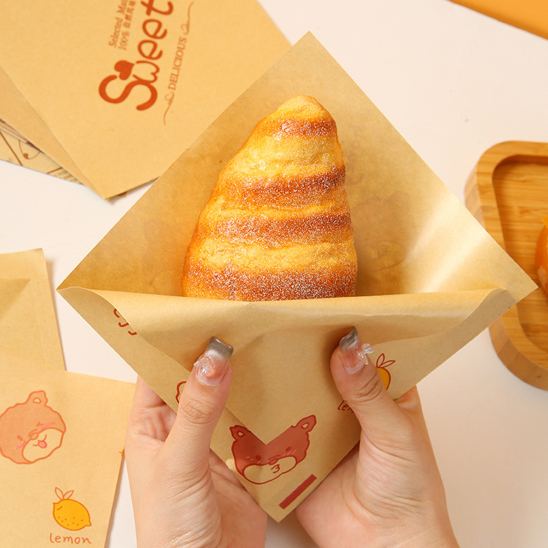 Embalaje triangular a prueba de aceite bolsa de papel sándwich torta asada mano agarrar bolsas de panquequeques carne de sopa bolsa de embalaje al por mayor