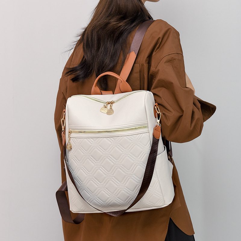 Mochila en relieve para mujer 2024 nueva moda para mujer mochila de viaje de ocio de gran capacidad