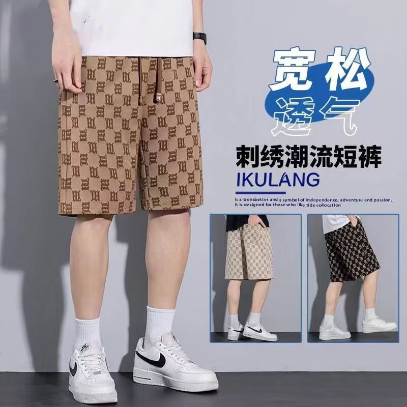 Camisas de ropa de seda de hielo delgada pantalones cortos casuales sueltos de verano estilo de Hong Kong pantalones de playa de hombre de moda pantalones casuales