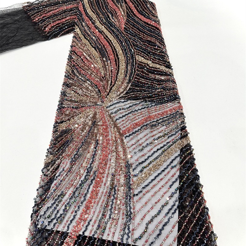 Tejido de malla de bordado de industria pesada bordado de tubo de perlas tridimensional vestido de boda cena tela de moda spot transfronterizo