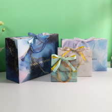 高档白卡纸礼品袋高级感大理石纹精美伴手礼物袋节日送礼手提袋子
