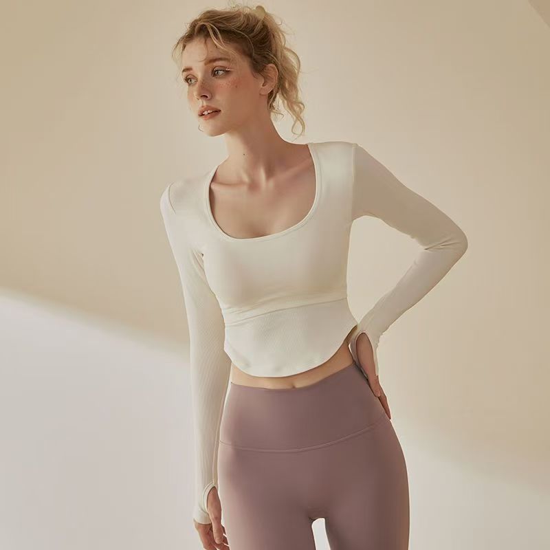 Yoga camiseta de mangas largas temperamento apretado femenino hueco hermosa espalda deportivo fitness con guarnición de dedo temperamento chaqueta cojín de pecho