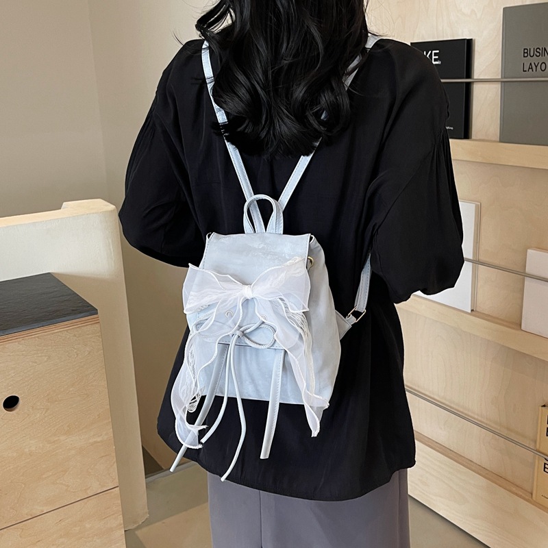 Gran capacidad coreana encantadora mochila de moda de ballet para mujeres 2024 nuevo bolso de cubo de arco de verano