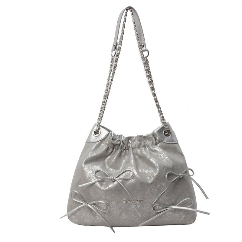 Bolsa de arco de moda explosiva para mujeres 2024 verano nuevo simple versátil bolso de brazo bolso de tendencia de viaje