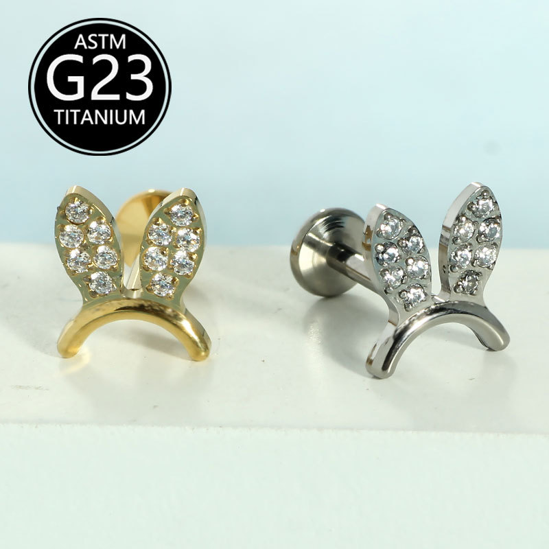 Silver pointed spike labret stud material detail