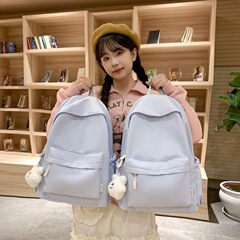 新商品の純色ファッションは大学生の女子かばんの初高校のリュックサックの女性の戸外の越境する大容量のリュックサックに似合います。