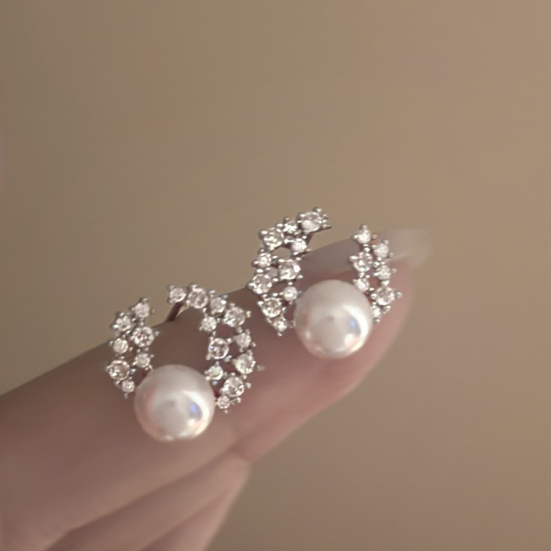 Aguja de plata, perla, circón, borla, pendientes de moda, lujo ligero, pendientes de alta gama, pendientes de todo fósforo exquisitos de nicho, mujeres al por mayor