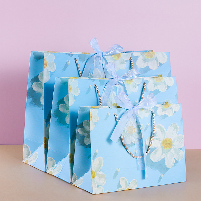 Elegante bolsa de regalo de crisantemo ins estilo Regalo de Cumpleaños bolsa de embalaje bolso de papel bolsa de regalo de mano horizontal bolsa de papel