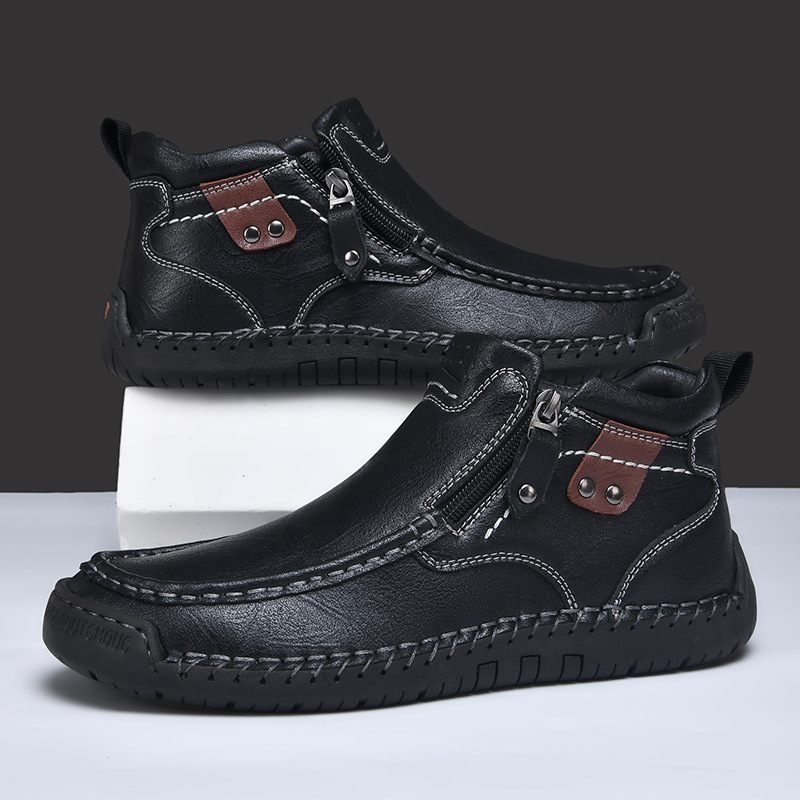 Nuevos zapatos casuales de hombre con cremallera lateral, botas cortas de moda, zapatos al aire libre de tamaño grande, invierno de comercio exterior transfronterizo 2025.