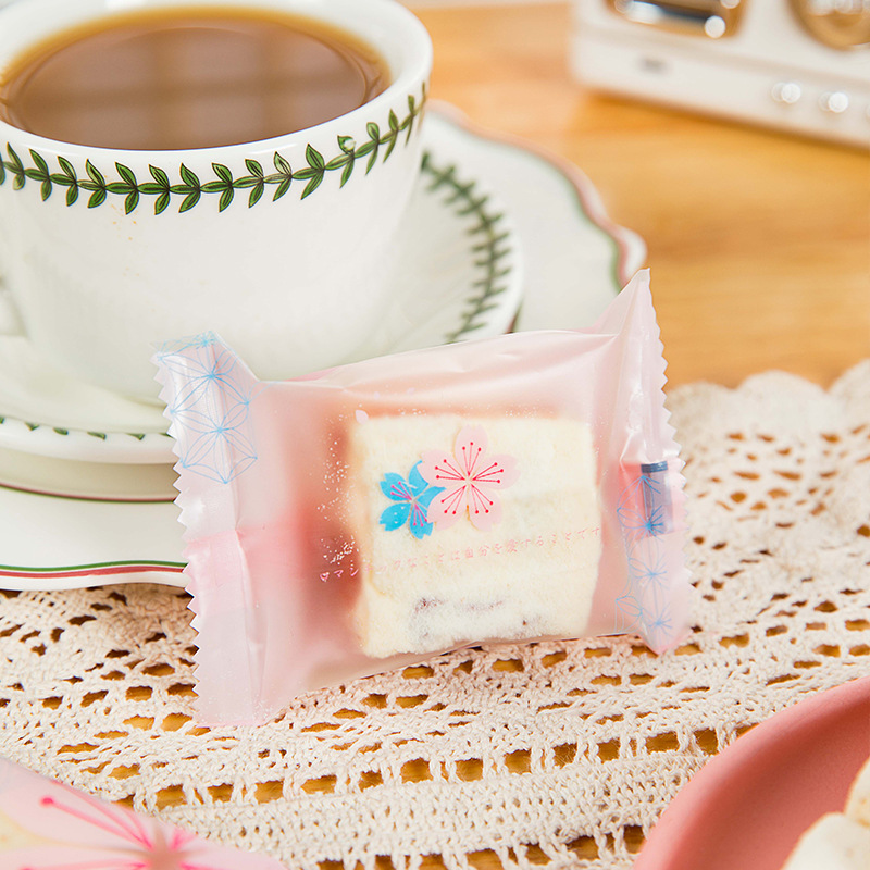 Copo de nieve de poliéster máquina crujiente sello autosellante embalaje turrón galleta embalaje transparente azufaifo leche bolsa de embalaje 100 piezas