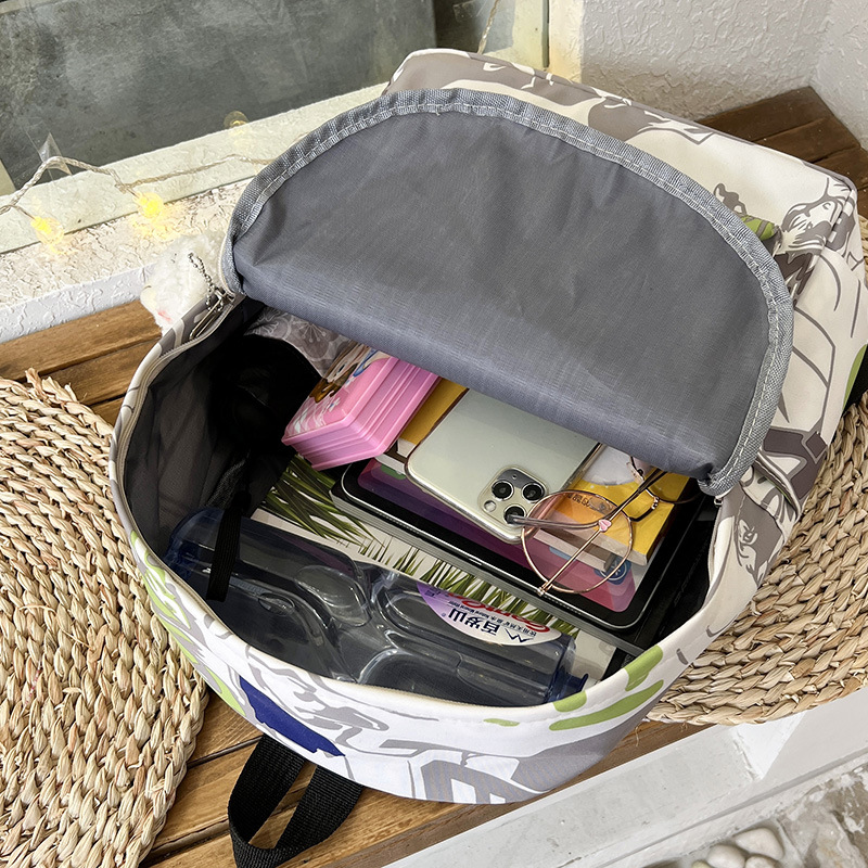 Moda mochila bolsa ins personalizado impreso graffiti estudiante universitario mochila de nylon moda casual todo a juego mochila para mujeres