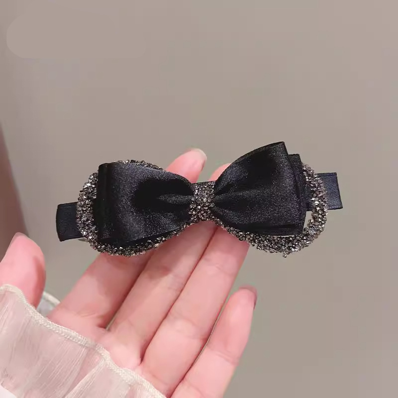 軽くて豪華な質感の蝶結びのヘアピンの小さい香風の黒い一字は後頭部の髪を挟みます。|undefined