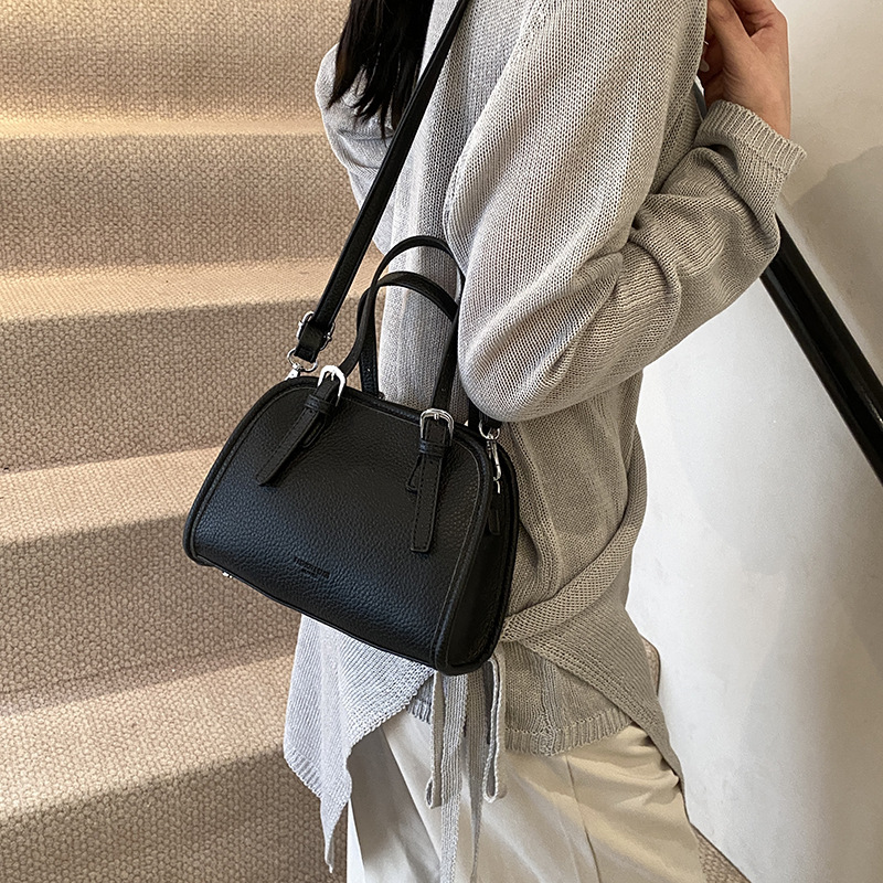 Bolsos populares de este año 2025 primavera y verano nuevo bolso femenino casual con patrón de lichi bolso de hombro simple bolso de mensajero de viaje