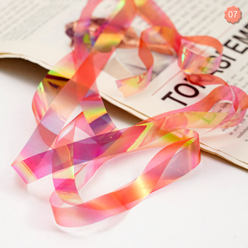 Nuevo arte de uñas transfronterizo cielo estrellado papel 1CM en caja Aurora papel de caramelo celofán arte de uñas joyería láser cielo estrellado papel