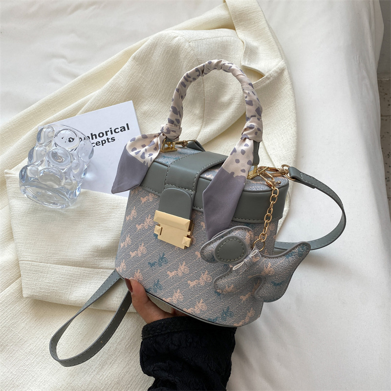 Borsa rotonda piccola da donna dal nuovo design di nicchia, nuova borsa a tracolla alla moda e di fascia alta, popolare borsa per il trucco portatile Instagram_voghion.com