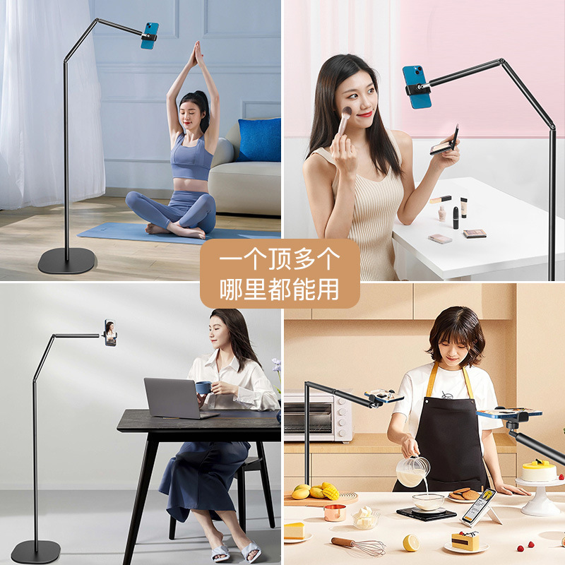 生放送の携帯電話専用スタンドが着地してネット赤アナウンサーが鏡を撮影して劇を追う怠け者の携帯電話スタンドを撮影した|undefined