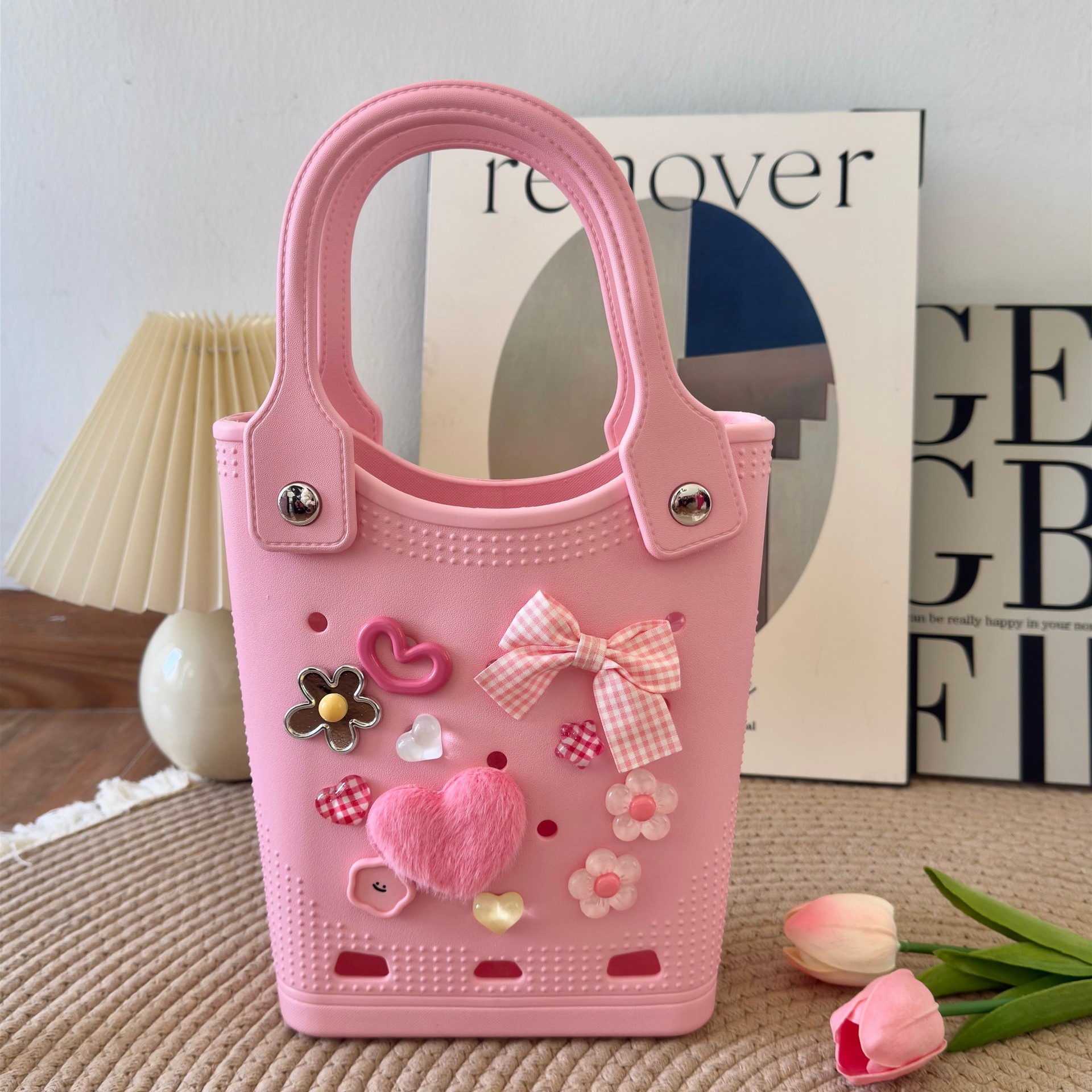 El nuevo bolso transfronterizo Eva Dongdong 100 se combina con el bolso decorado DIY dongdong, el bolso de dibujos animados, el nicho lleva el bolso de playa.