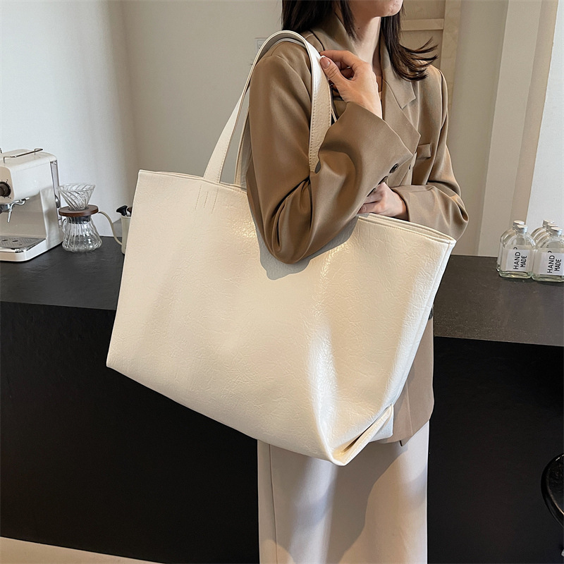 女性のための大容量テクスチャバッグ 2025 新しいニッチデザインシングルショルダー大型バッグパーソナライズされたシンプルなポータブルトートバッグ|undefined